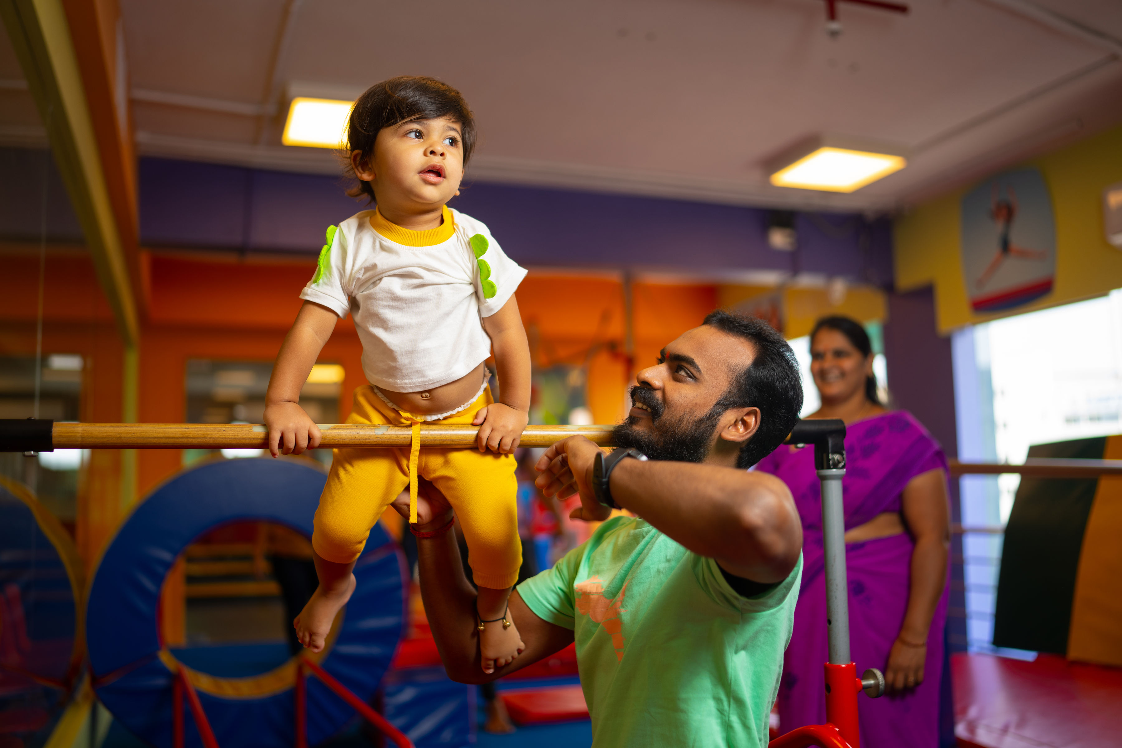 Child happily exercising in The Little Gym