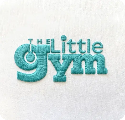 Child happily exercising in The Little Gym